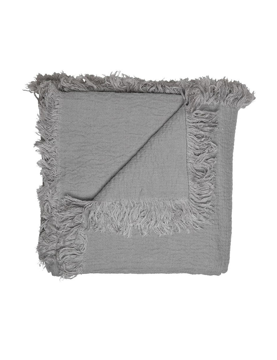 textured linen throw with fringe trim in cement colour