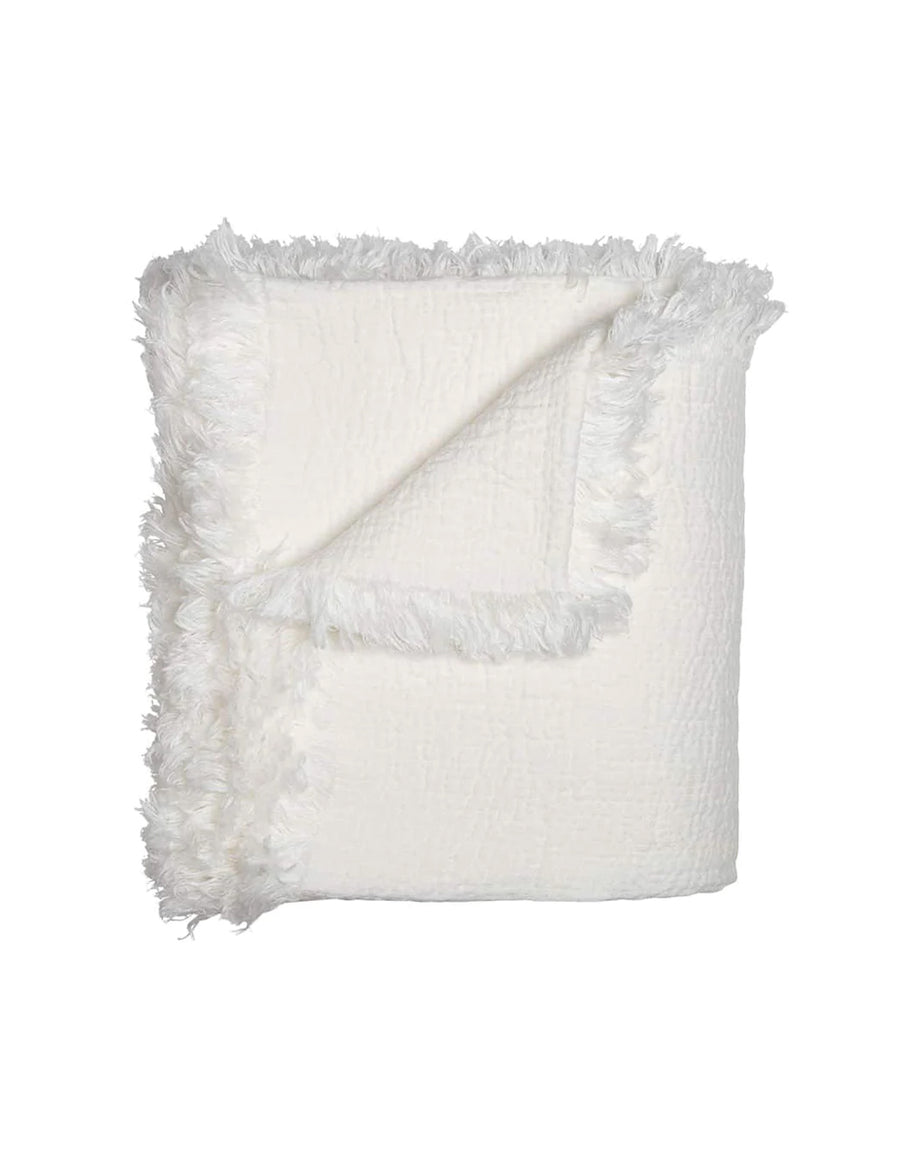 textured linen throw with fringe trim in ivory colour