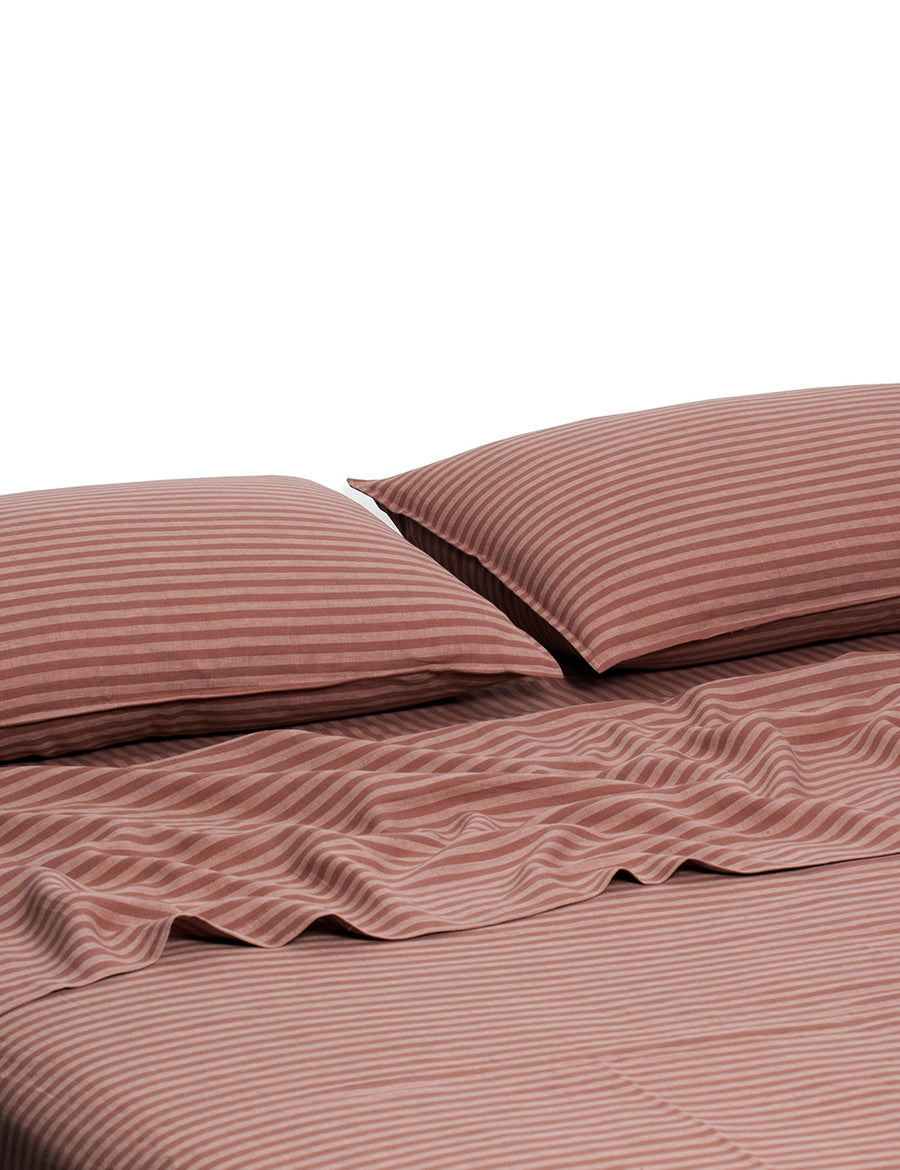 chaplin stripe linen sheet set in grenache colour