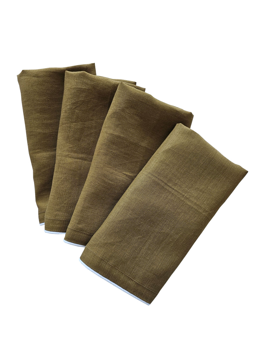 linen table napkins in olive colour with white piping