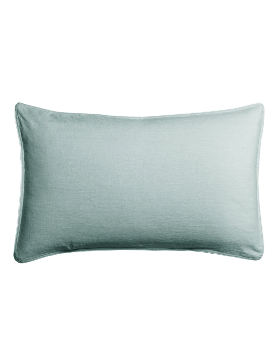 piped pillowcases in azure colour with contrast piping in white
