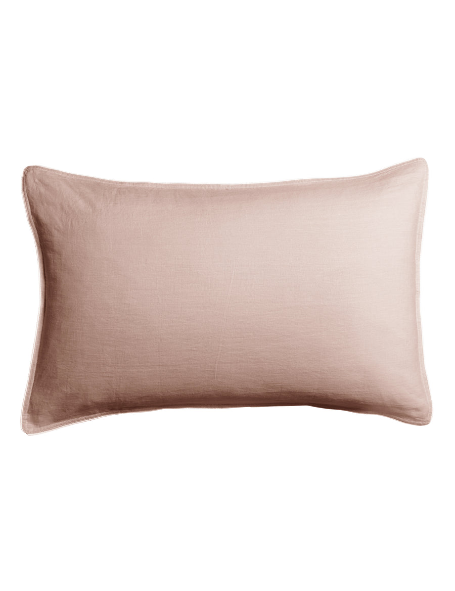 piped pillowcases in blush colour with contrast piping in white