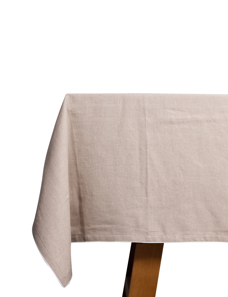 piped linen tablecloth in natural with white piping