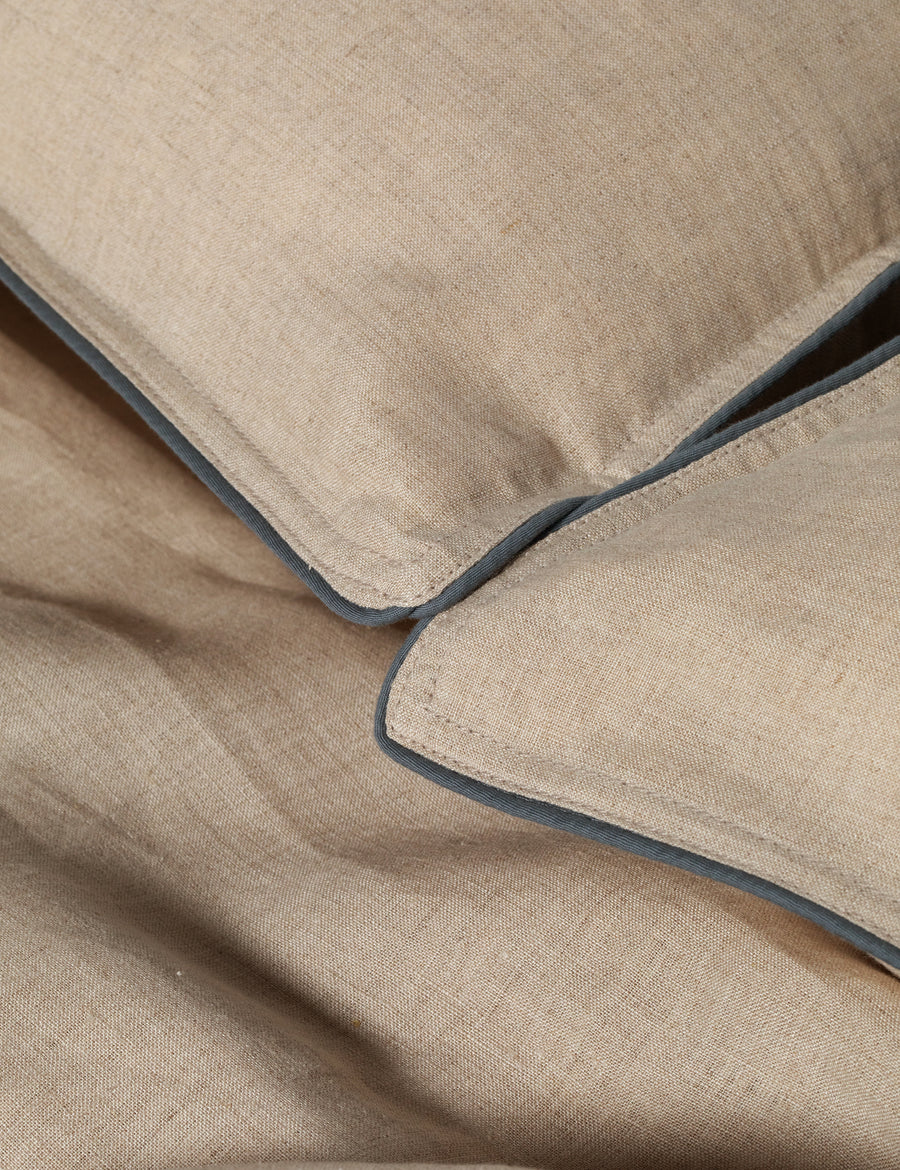 details of piped pillowcases in natural colour with contrast piping in liberty