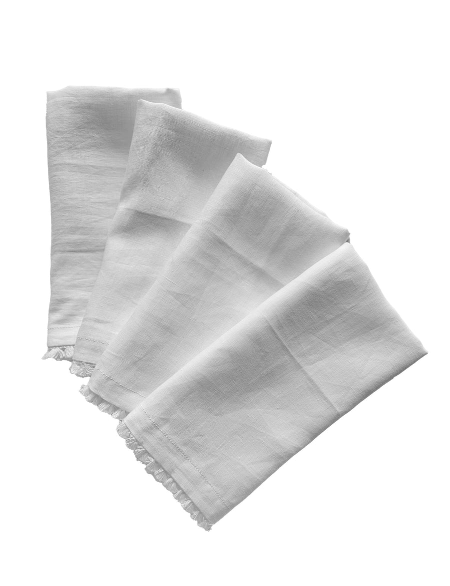 linen table napkins in white colour with cotton tassel trim in white