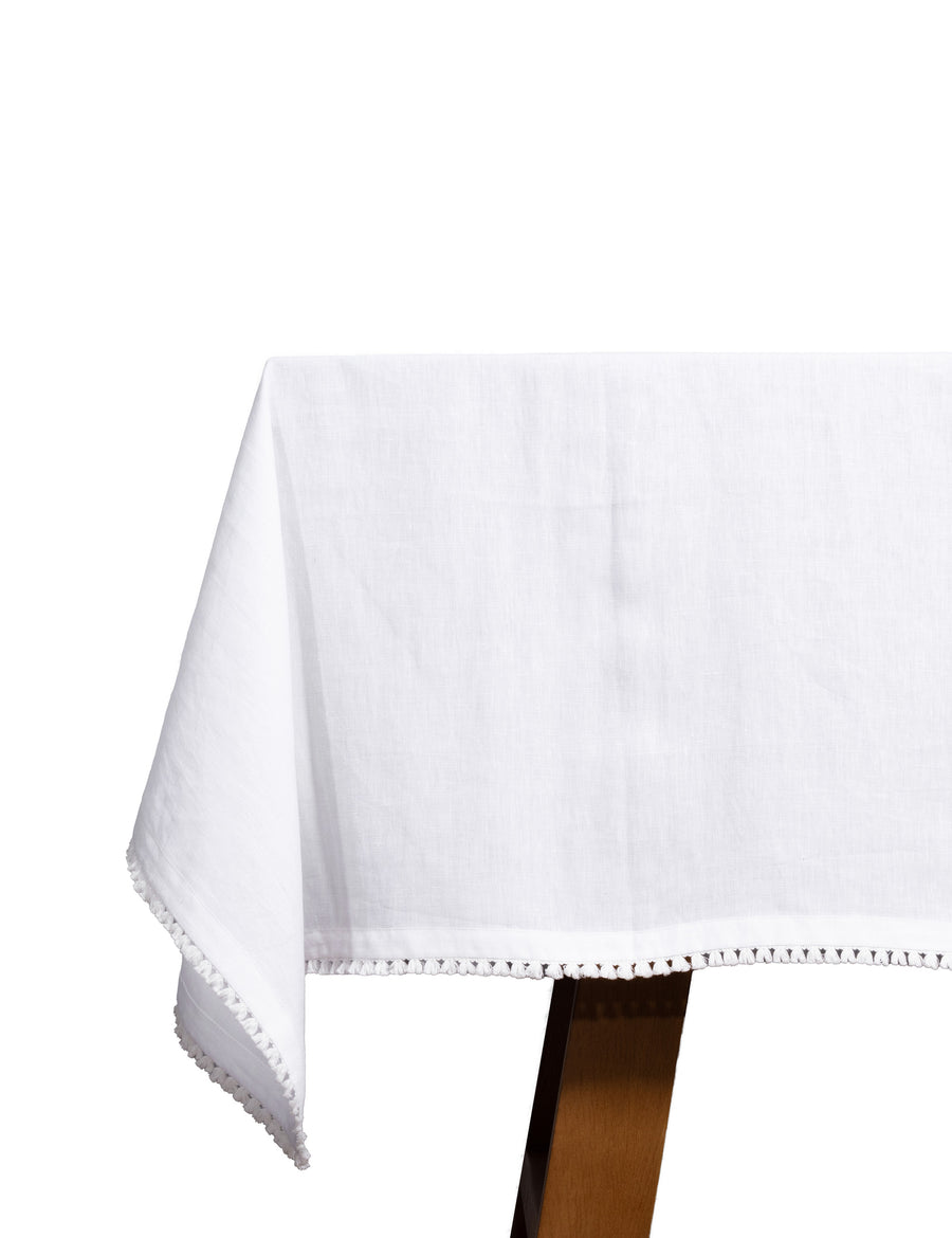 linen tablecloth in white colour with cotton tassel trim in white