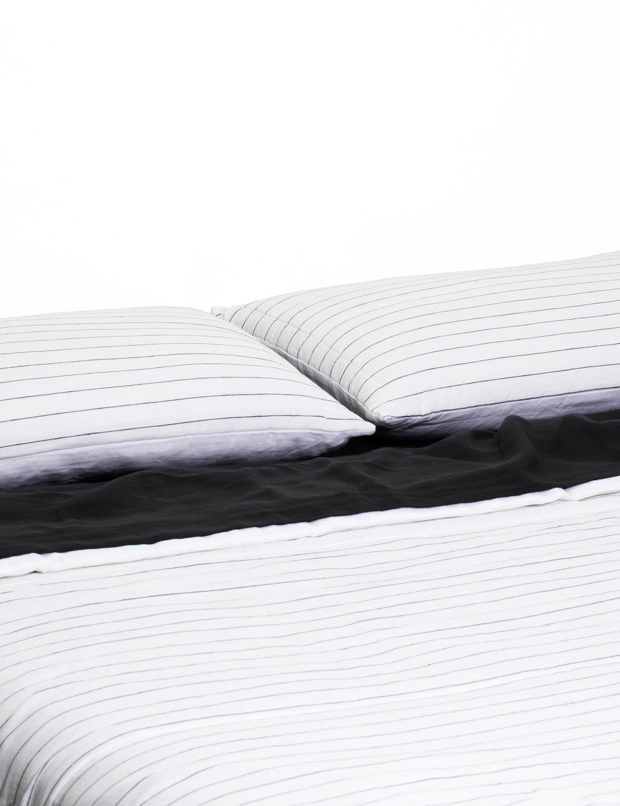 luxurious reversible quilted coverlets in white and charcoal pinstripe colour