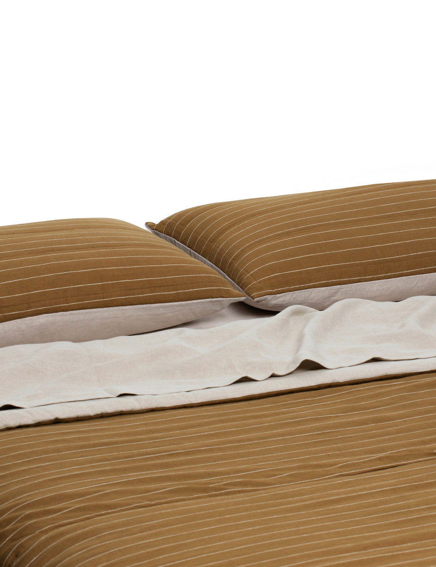luxurious reversible quilted coverlets in natural and olive pinstripe colour