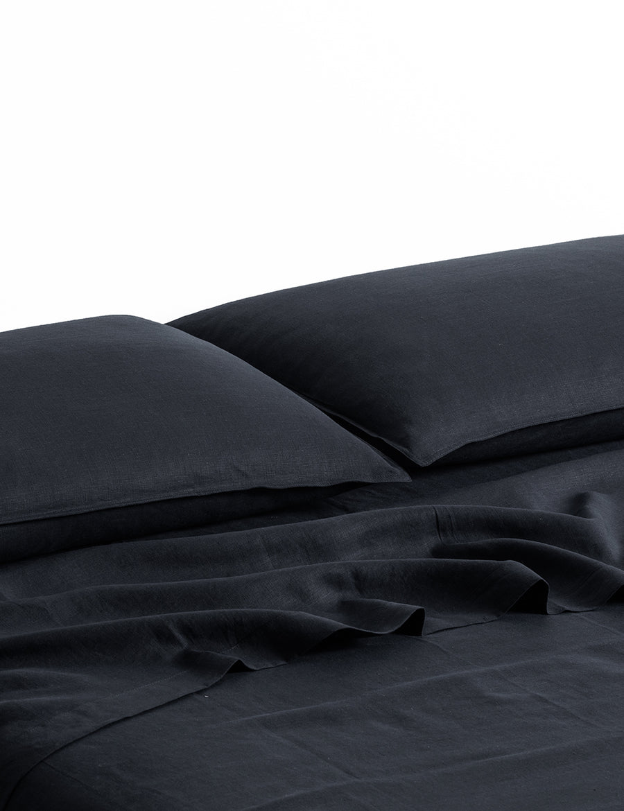 ecom shot of our classic linen sheet set in charcoal colour