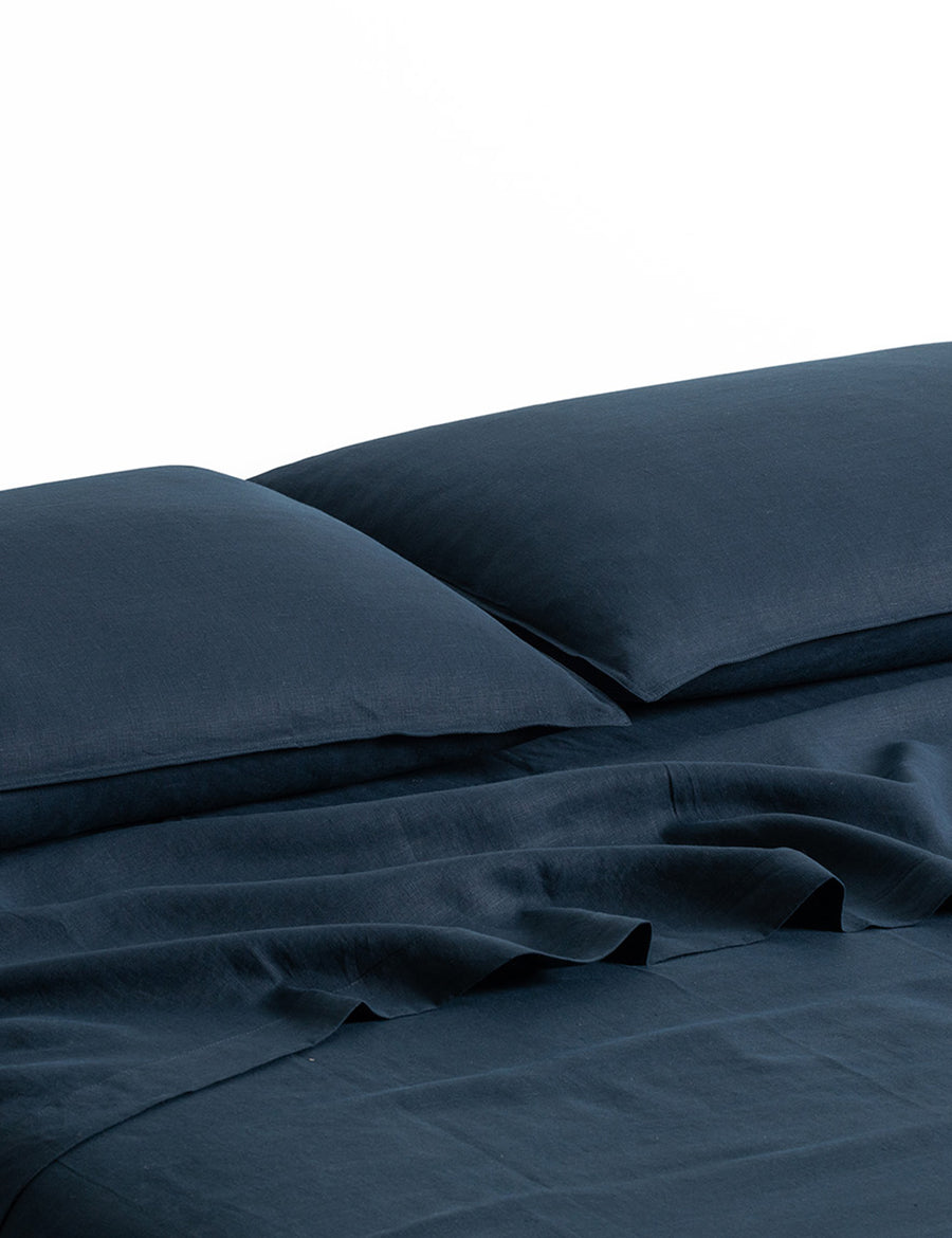 ecom shot of our classic linen sheet set in navy colour
