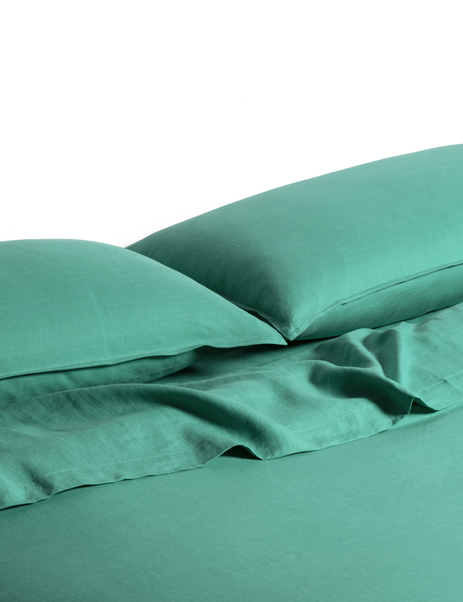 ecom shot of our classic linen sheet set in oasis colour