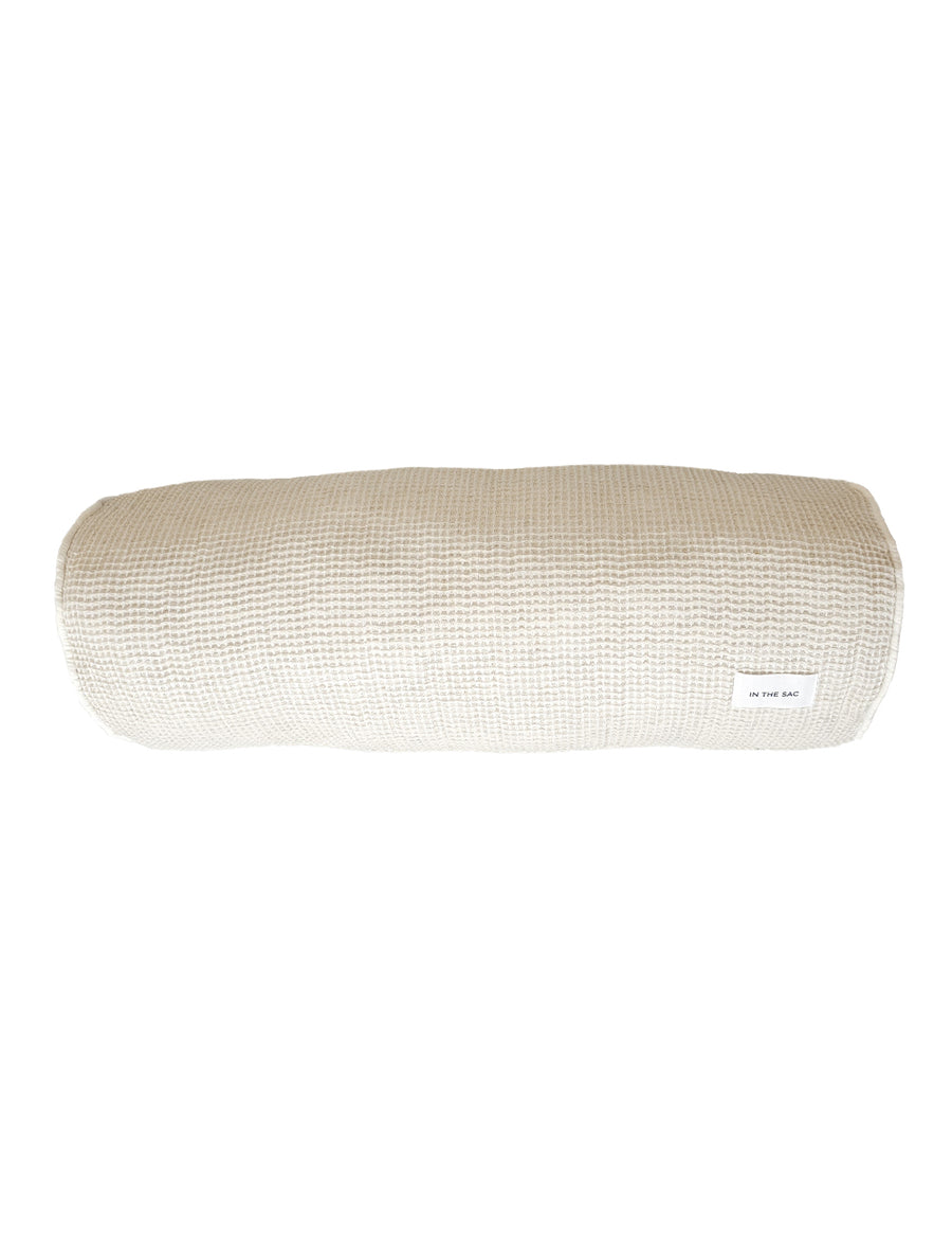 bolster pillow in natural colour with piping details in natural