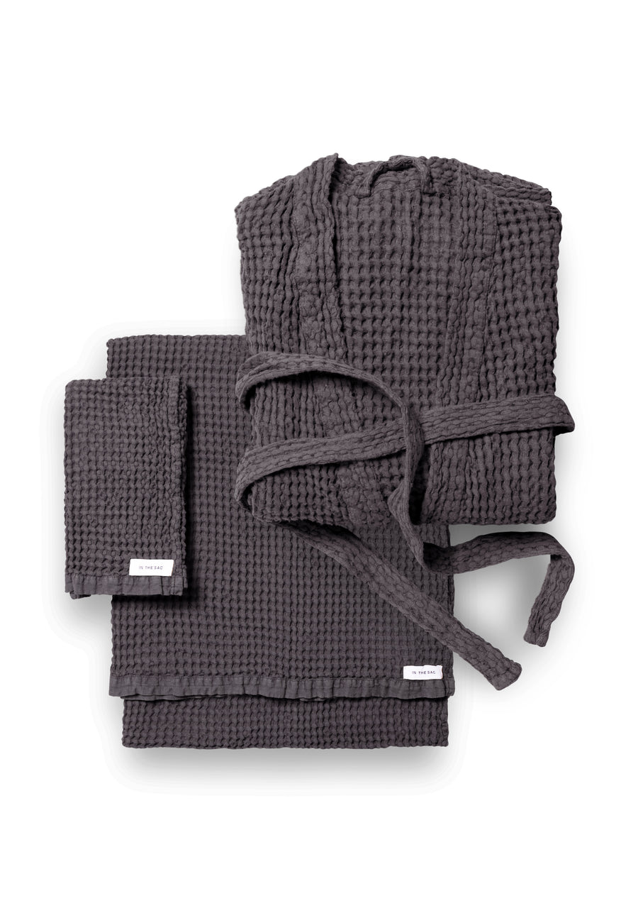 bundle photo of the linen waffle hand towel, bath towel and bath robe in graphite colour