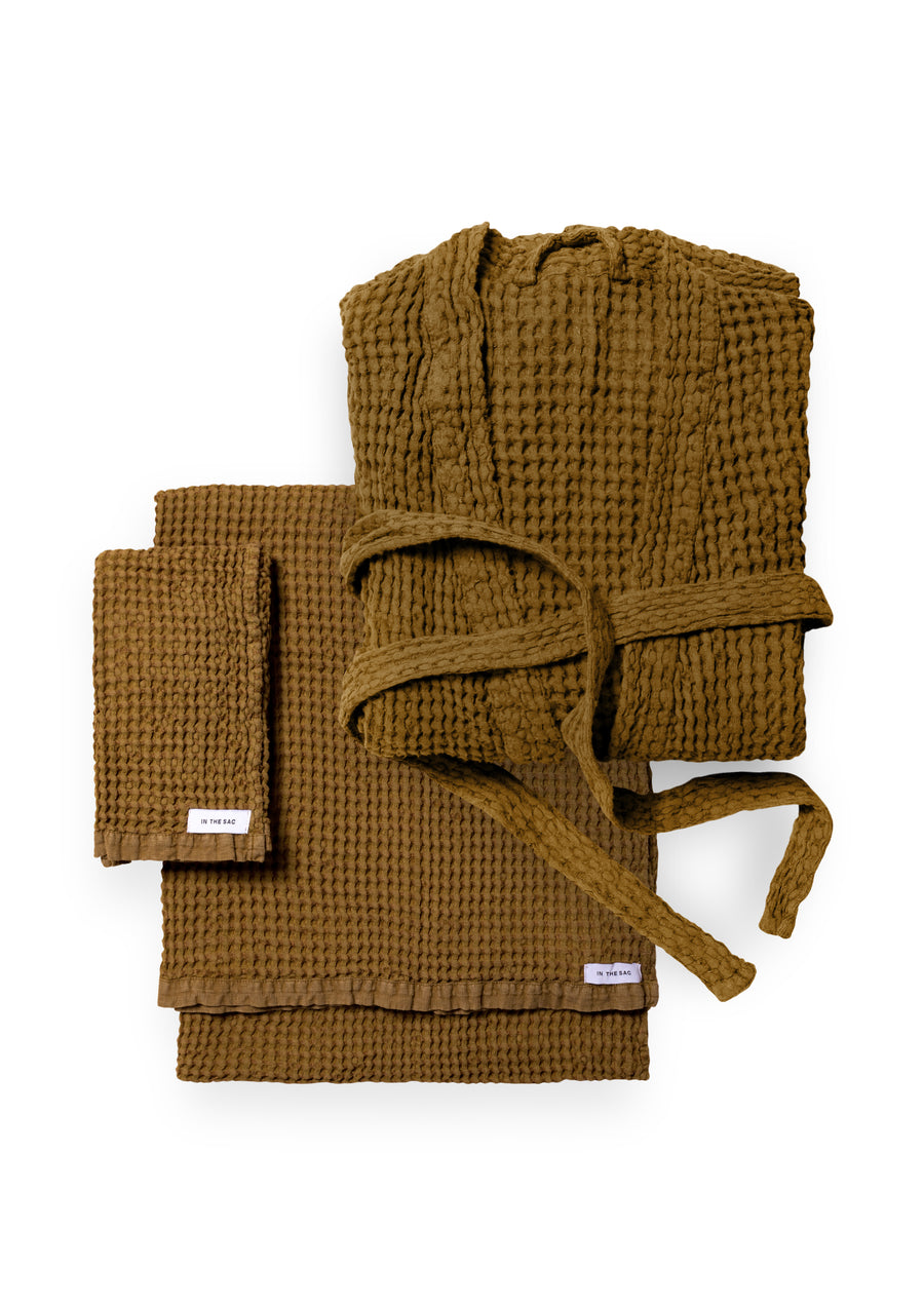 bundle photo of the linen waffle hand towel, bath towel and bath robe in olive colour