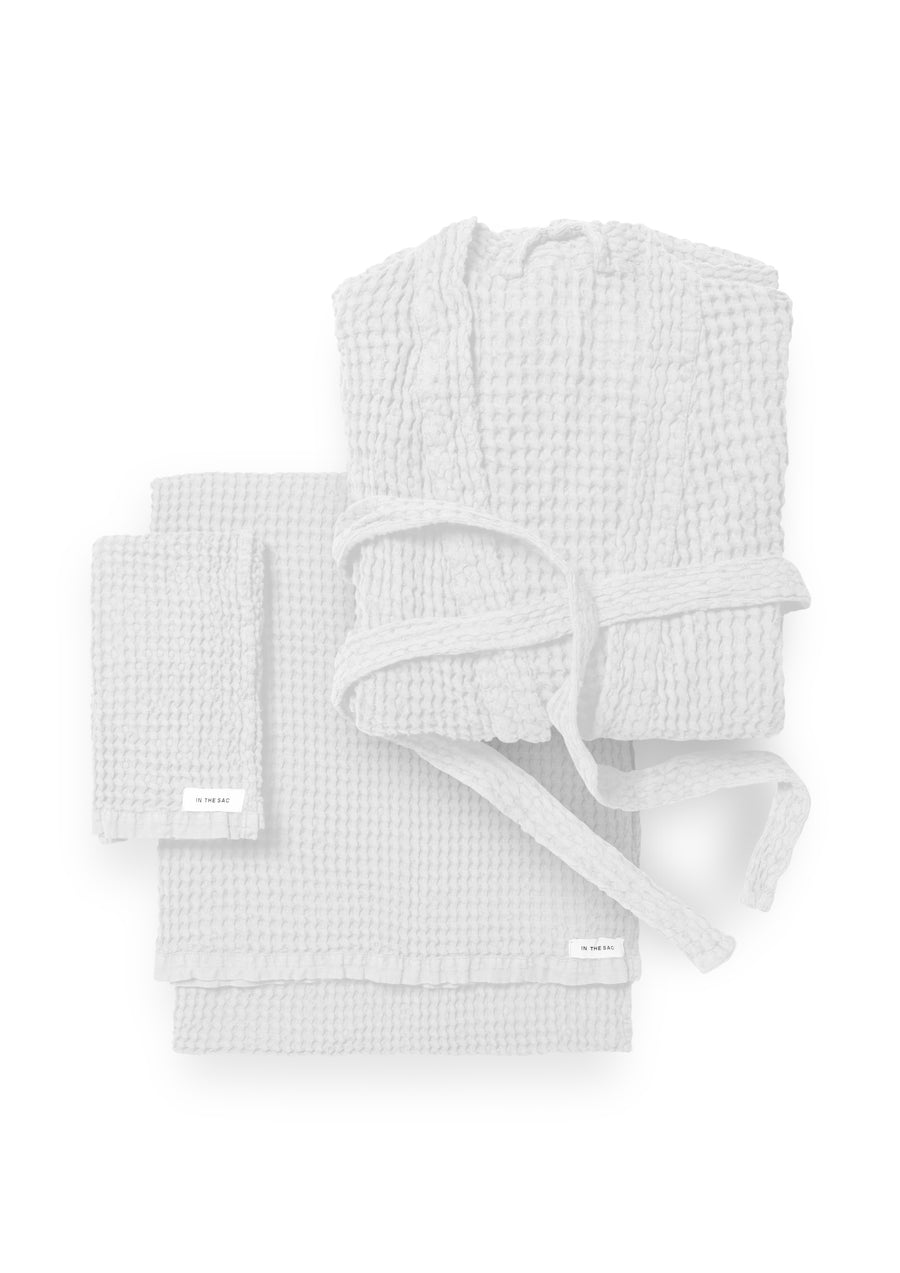 bundle photo of the linen waffle hand towel, bath towel and bath robe in white colour