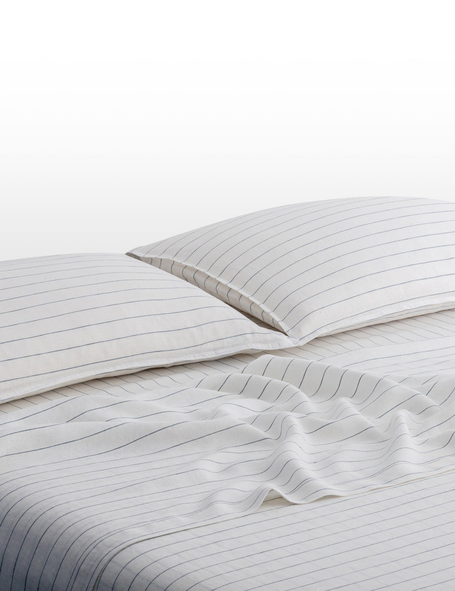 pinstripe linen sheet set in white with cloud stripes