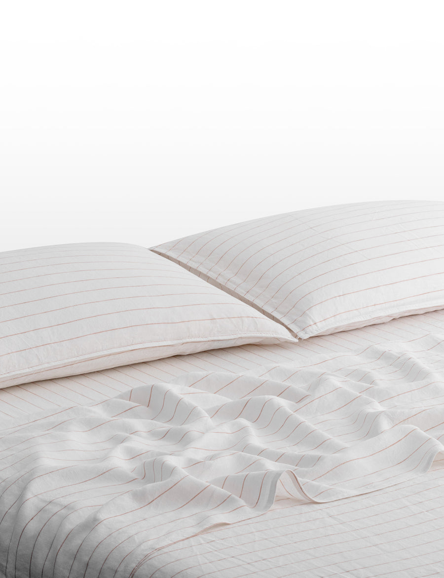 pinstripe linen sheet set in white with nude stripes