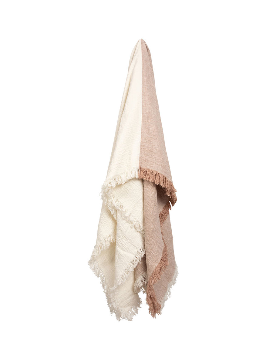 hanging photo of textured linen throw with fringe trim in colour block nude with ivory