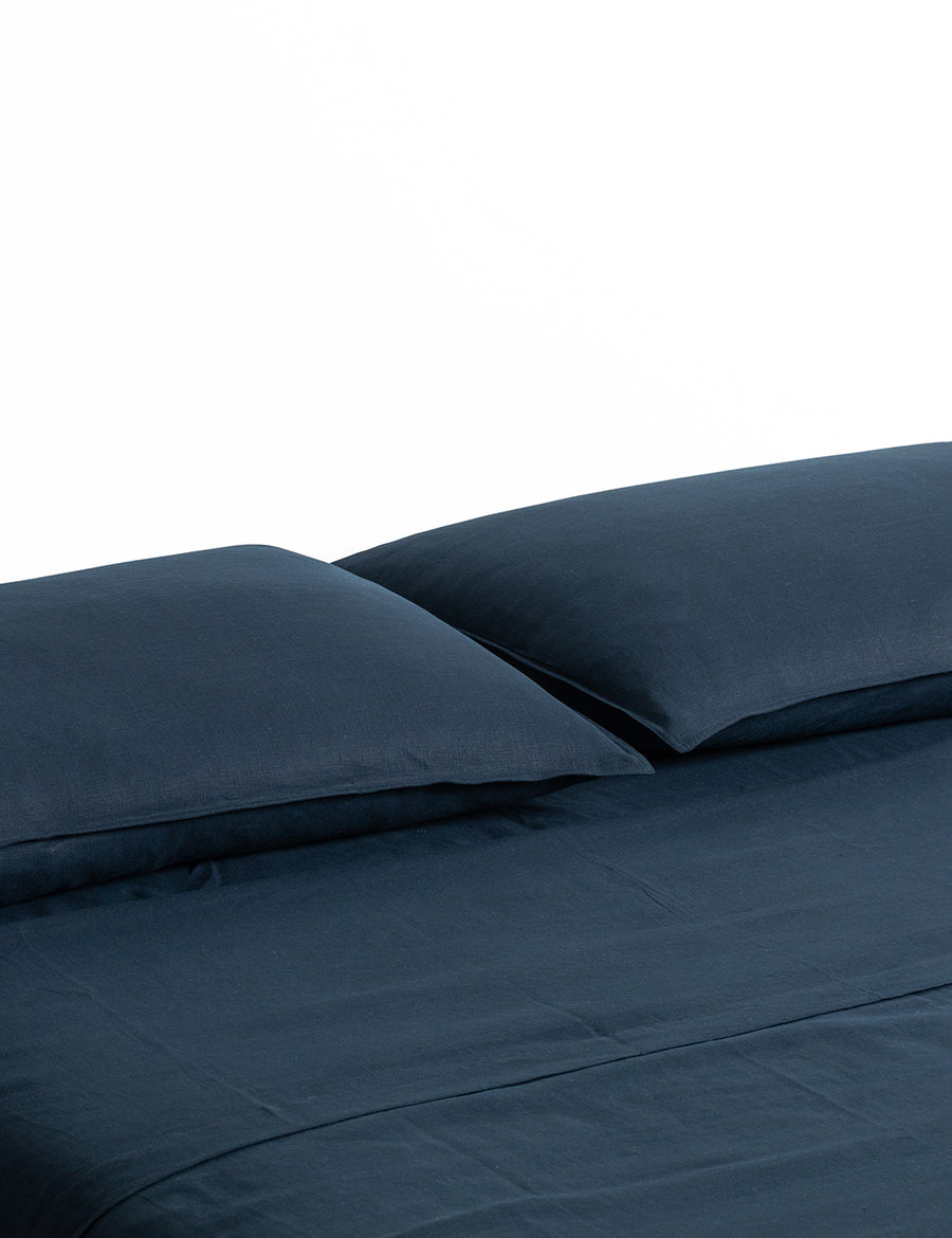 ecom shot of our classic linen sheet set in navy colour