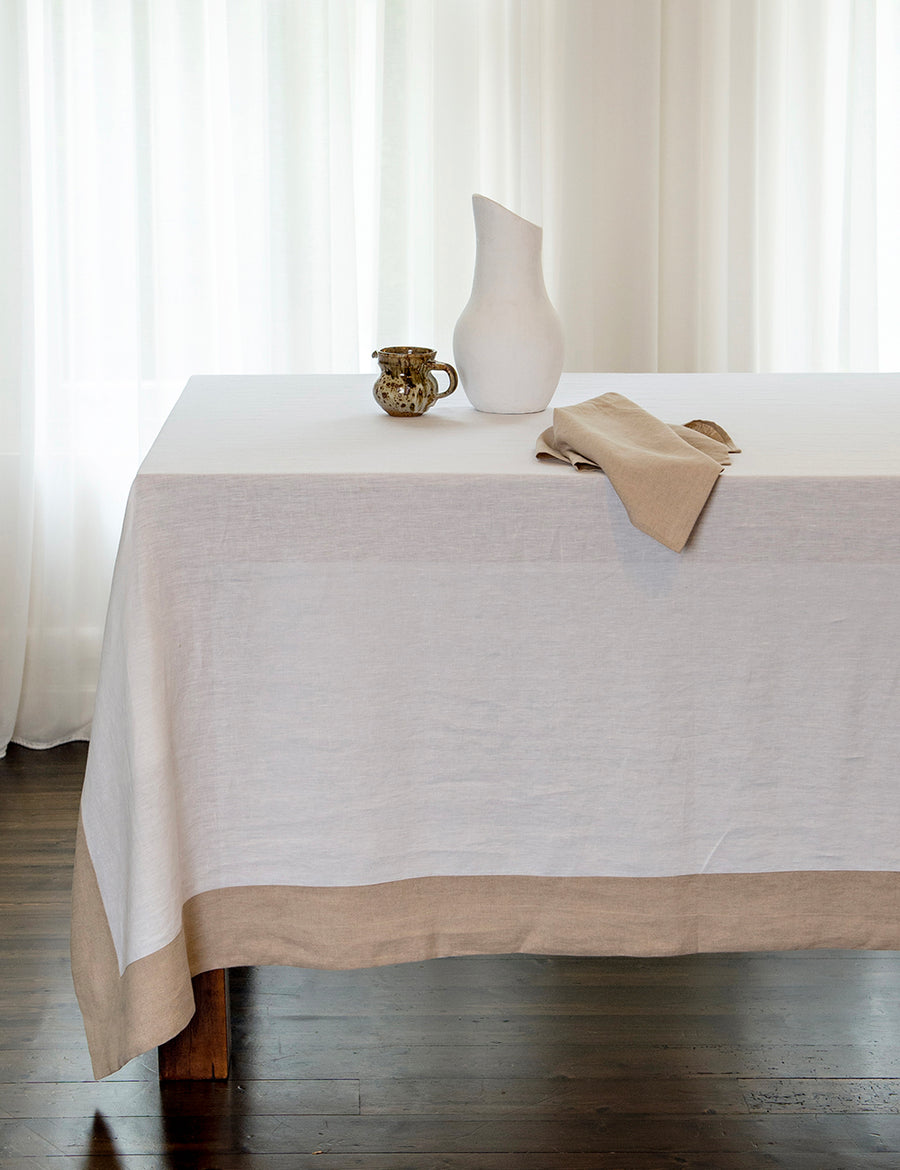 reversible linen tablecloth in white and natural with modern vase