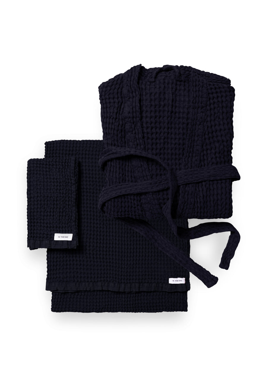 bundle photo of the linen waffle hand towel, bath towel and bath robe in navy colour