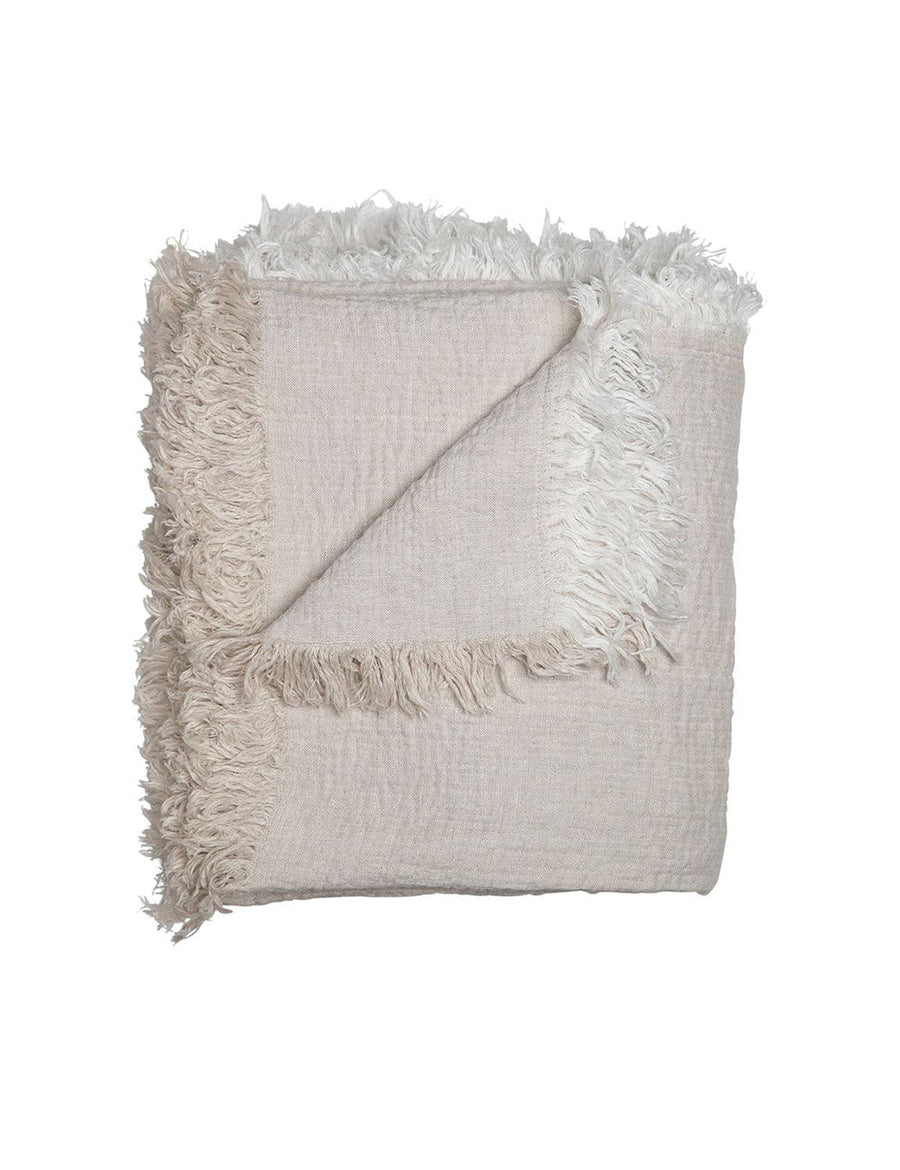 textured linen throw with fringe trim in natural colour