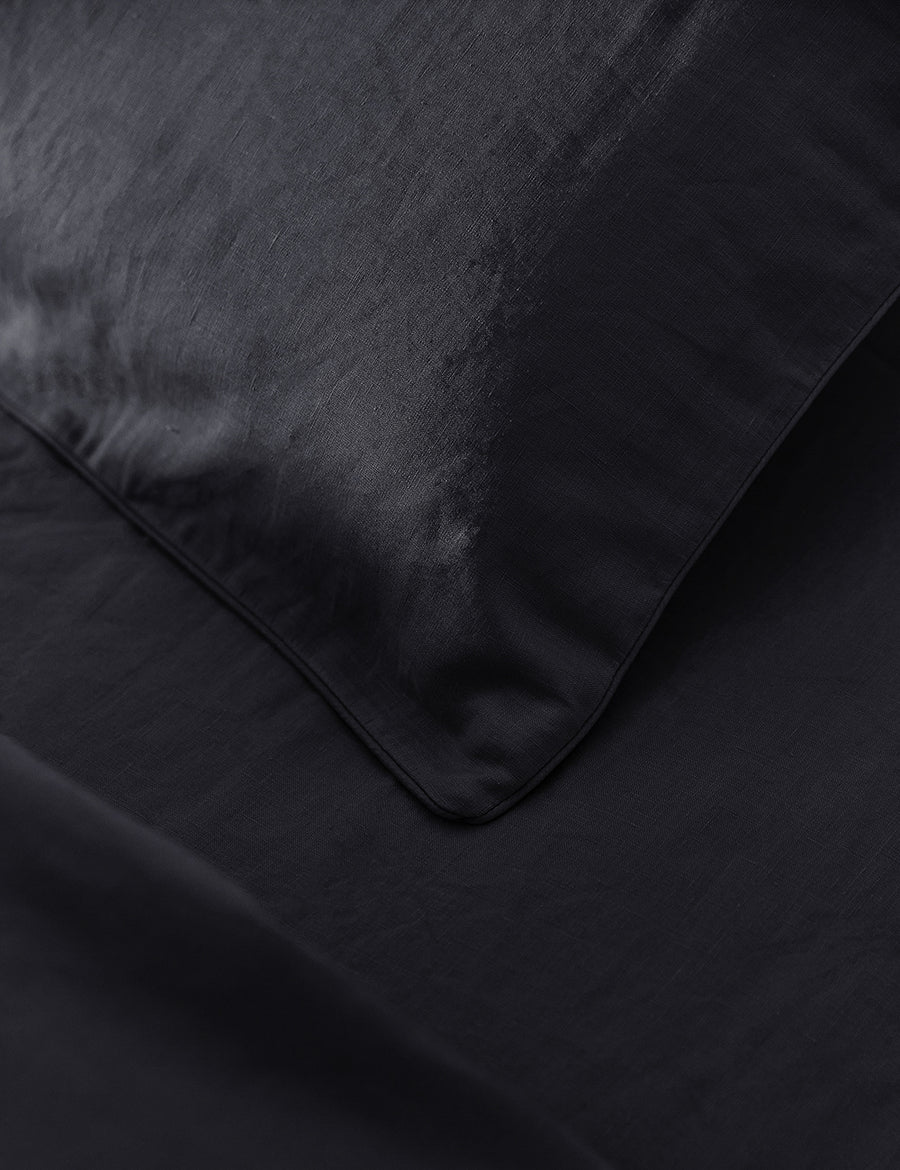 details of piped charcoal pillowcase