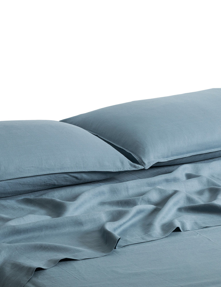 ecom shot of our classic linen sheet set in liberty colour
