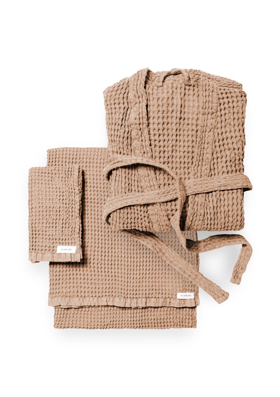 bundle photo of the linen waffle hand towel, bath towel and bath robe in nude colour