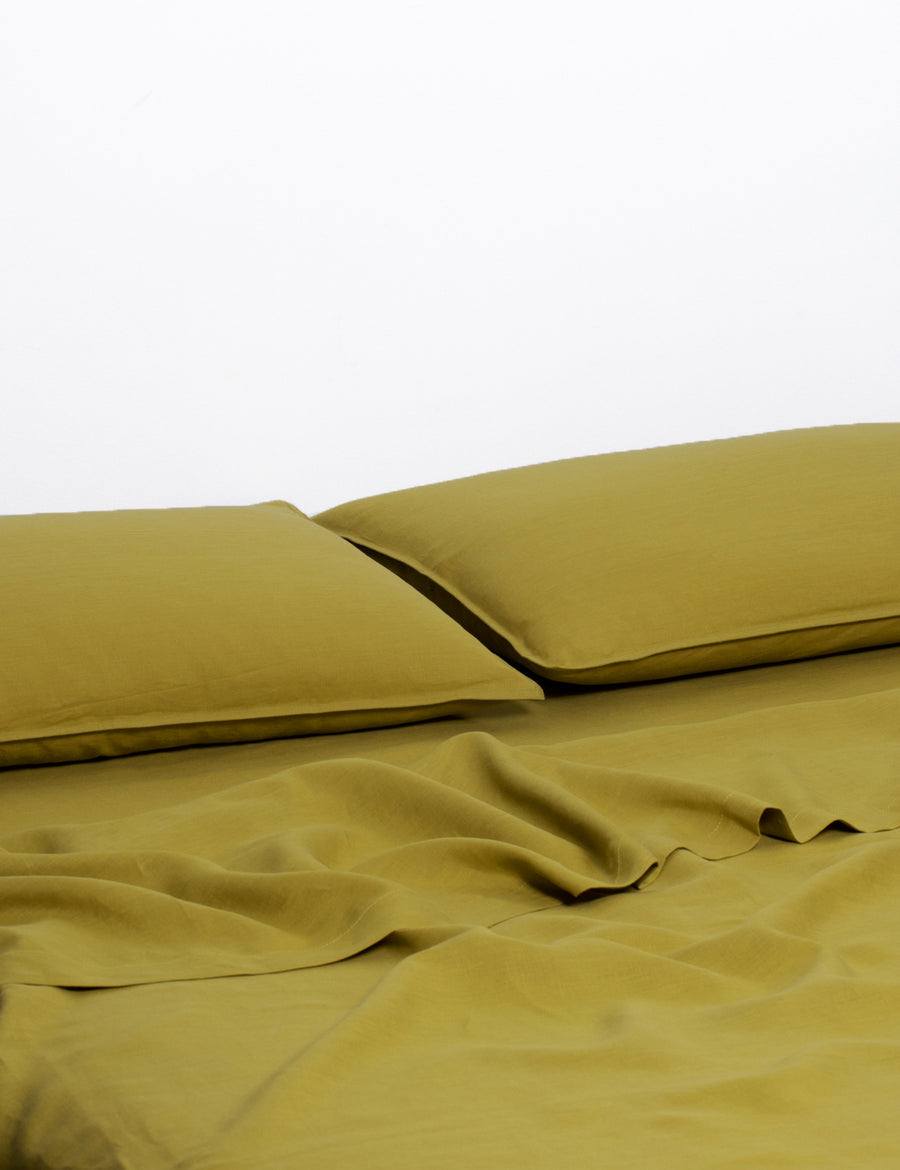 ecom shot of our classic linen sheet set in willow colour
