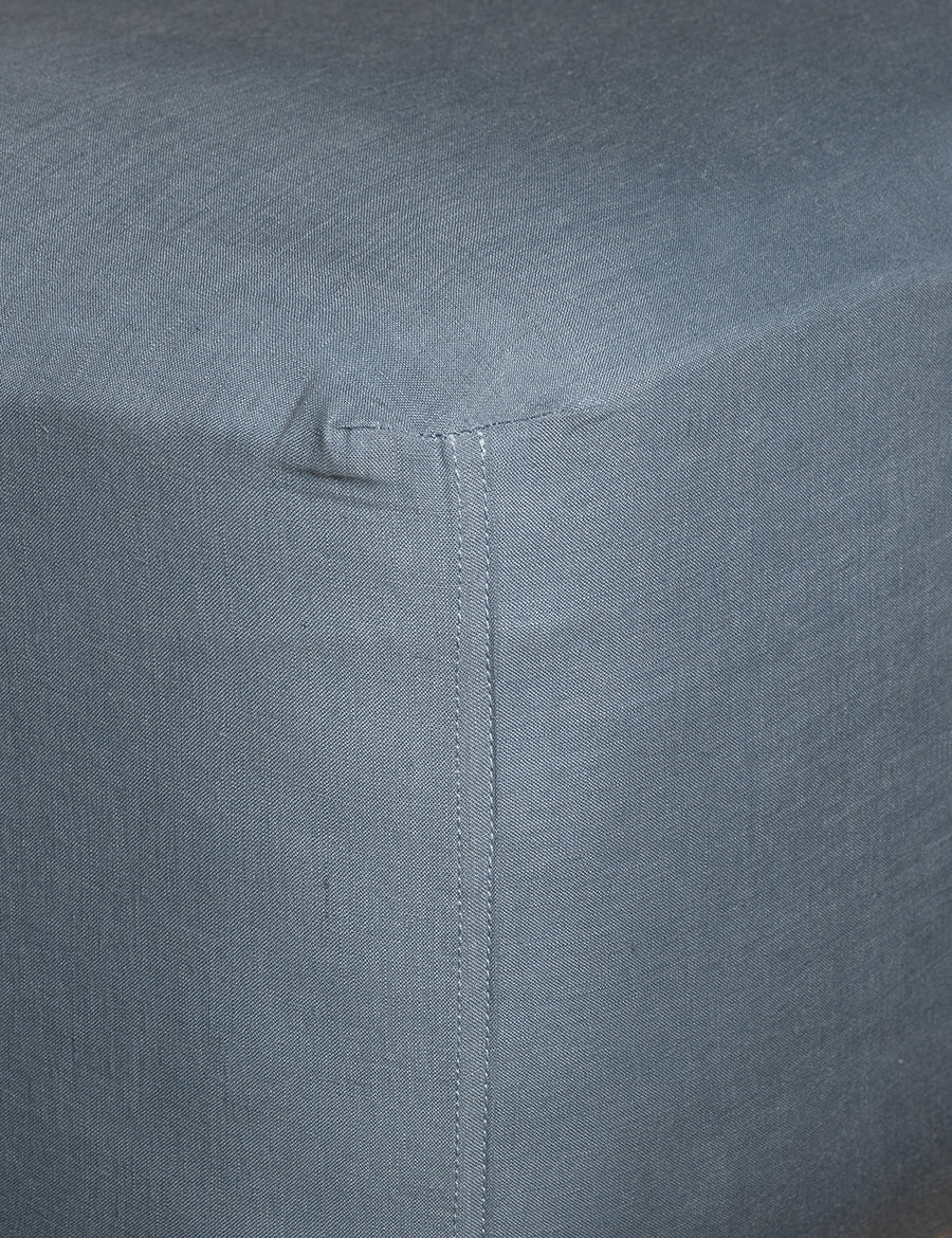 corner details of linen fitted sheet in liberty colour
