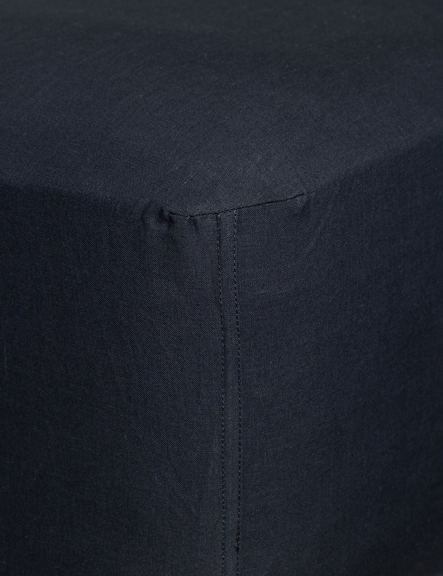 corner details of linen fitted sheet in navy colour
