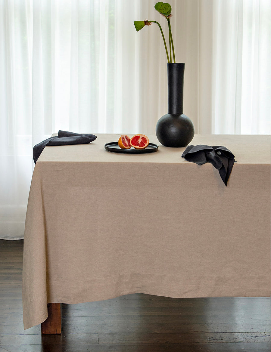 linen tablecloth in natural with charcoal coloured decor